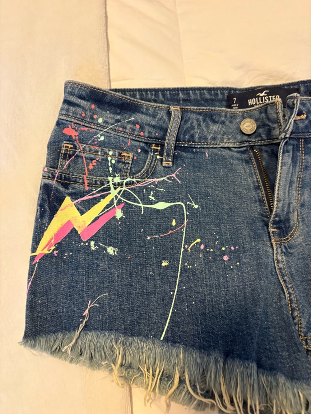 Hollister Dark Blue Denim Cutoff Shorts with Neon Paint Lightning - Picture 9 of 10